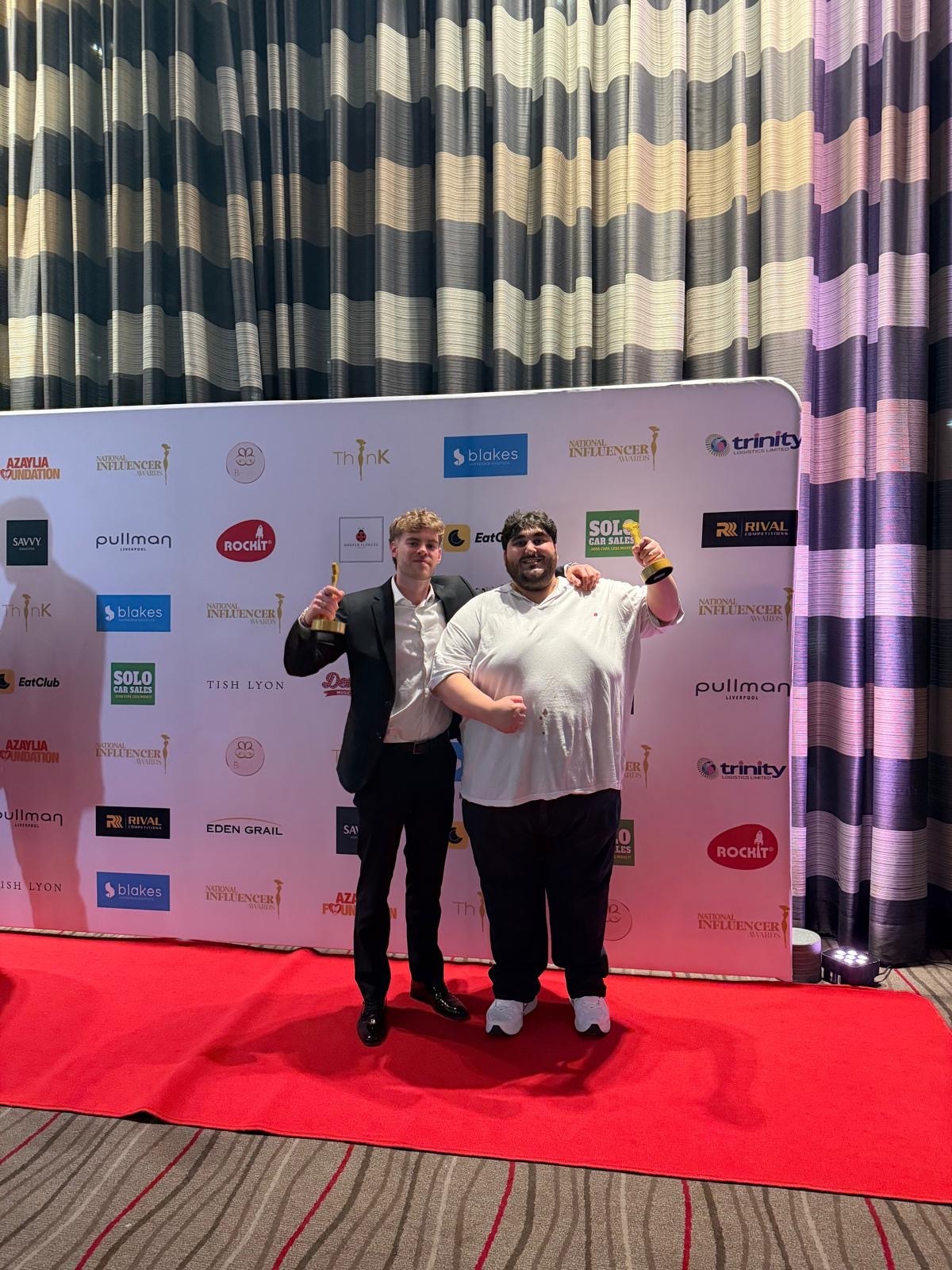 Daud Butt and Sam McCarthy with their awards at the National Influencer Awards 2026 in Liverpool